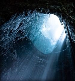 Low angle view of icicle in cave