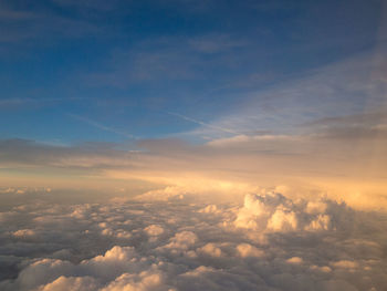 Scenic view of clouds in sky at sunset