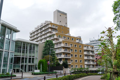 Exterior of buildings in city against sky