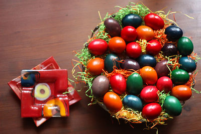 High angle view of tomatoes in container on table