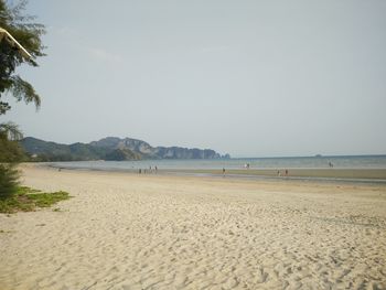 Scenic view of beach against clear sky