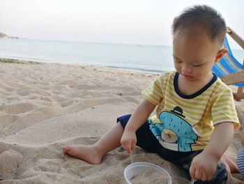 Boy playing on beach