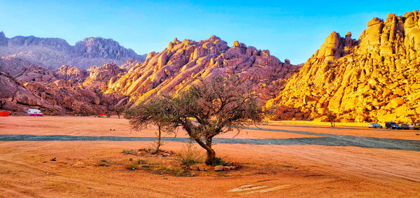 Scenic view of landscape and mountains against sky