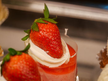 Close-up of strawberry on ice cream