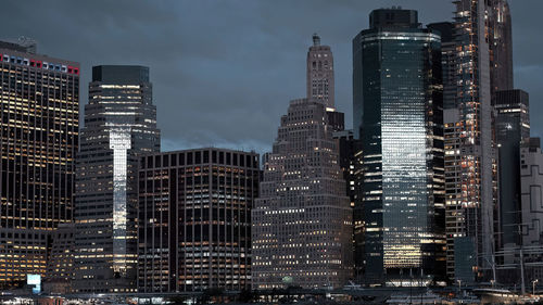 Illuminated buildings in city at night,new york skyline at night