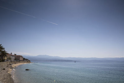 Scenic view of sea against blue sky