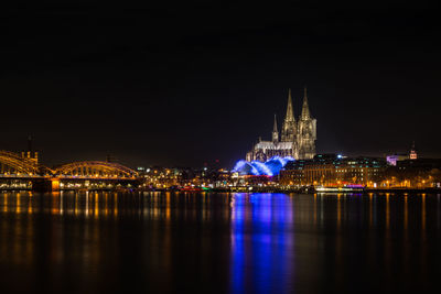 Illuminated city lit up at night