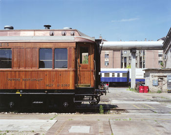 Train on railroad track against sky