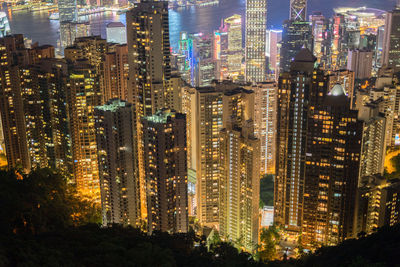 Aerial view of illuminated buildings in city