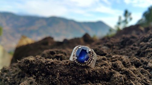 Diamond ring on rock