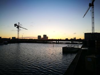 Silhouette of pier at sunset
