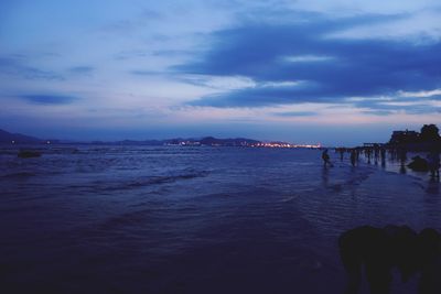 Scenic view of sea against cloudy sky