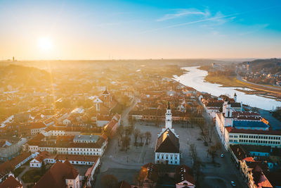 High angle view of city buildings during sunset