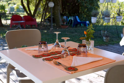 Romantically set table for two on the garden patio