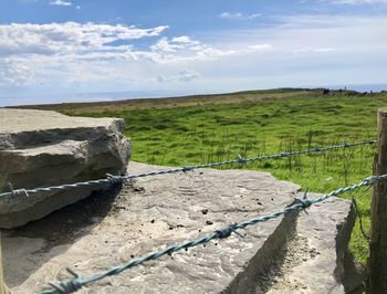 Scenic view of land against sky