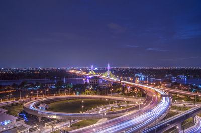 High angle view of light trails on city street at night