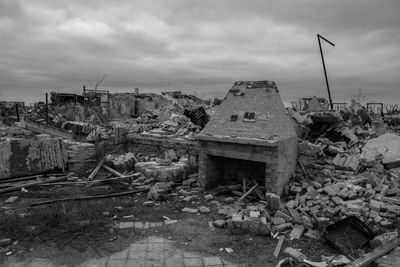 Abandoned building against sky