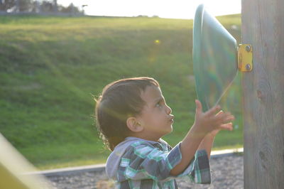 Side view of boy playing