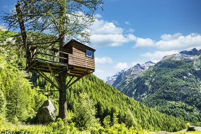 Scenic view of landscape and mountains against sky