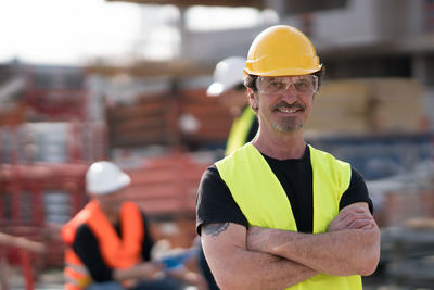 Portrait of confident architect at construction site