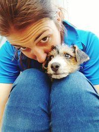 Portrait of young woman with dog