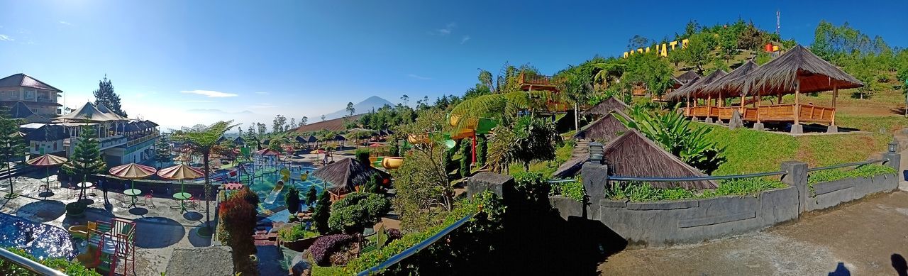 PANORAMIC VIEW OF TEMPLE AGAINST BUILDING