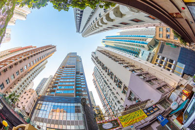 Low angle view of modern buildings against sky