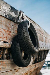 Car wheels on the abandoned rusty ship