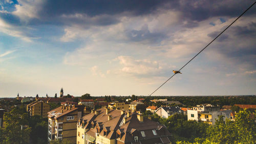 Aerial view of town against sky