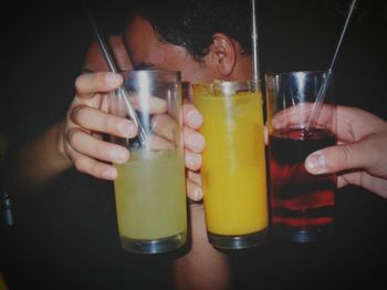 Close-up of hand holding drink