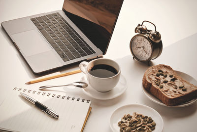 High angle view of coffee cup on table