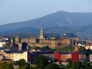 High angle view of townscape against mountains