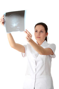 Full length of a woman standing against white background