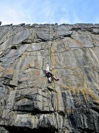 Young girl rock climbing 