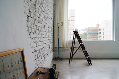 Damaged wall of empty modern apartment