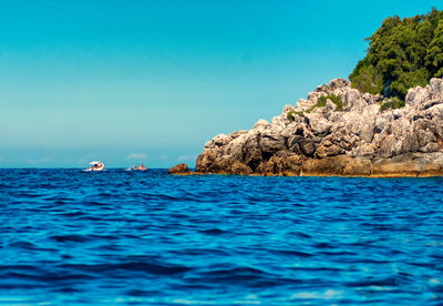 Scenic view of sea against clear sky