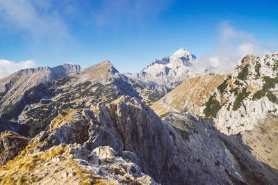 Panoramic view of snowcapped mountains against sky