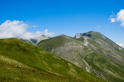 Scenic view of landscape against sky in montemonaco, marche, italy 