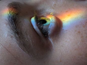 Sunlight falling on thoughtful boy eye