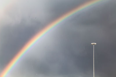 Low angle view of rainbow against sky