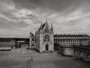 View of historic building against cloudy sky