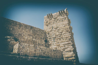 Low angle view of fort against the sky