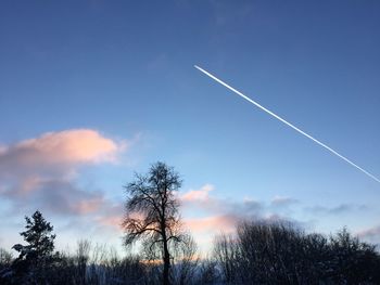 Low angle view of vapor trail in sky