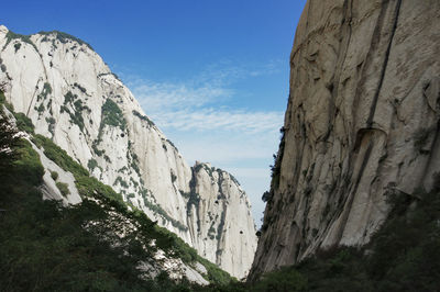 Low angle view of mountains against sky