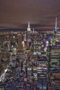 High angle view of illuminated buildings in city