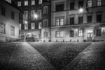 Buildings in city at night