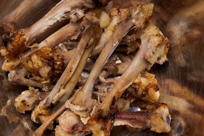 High angle view of meat on barbecue