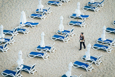 High angle view of man standing on beach