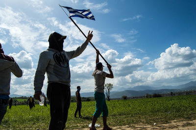 Men at refugee camp during protest