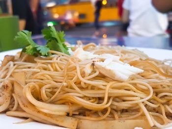 Close-up of noodles in plate on table